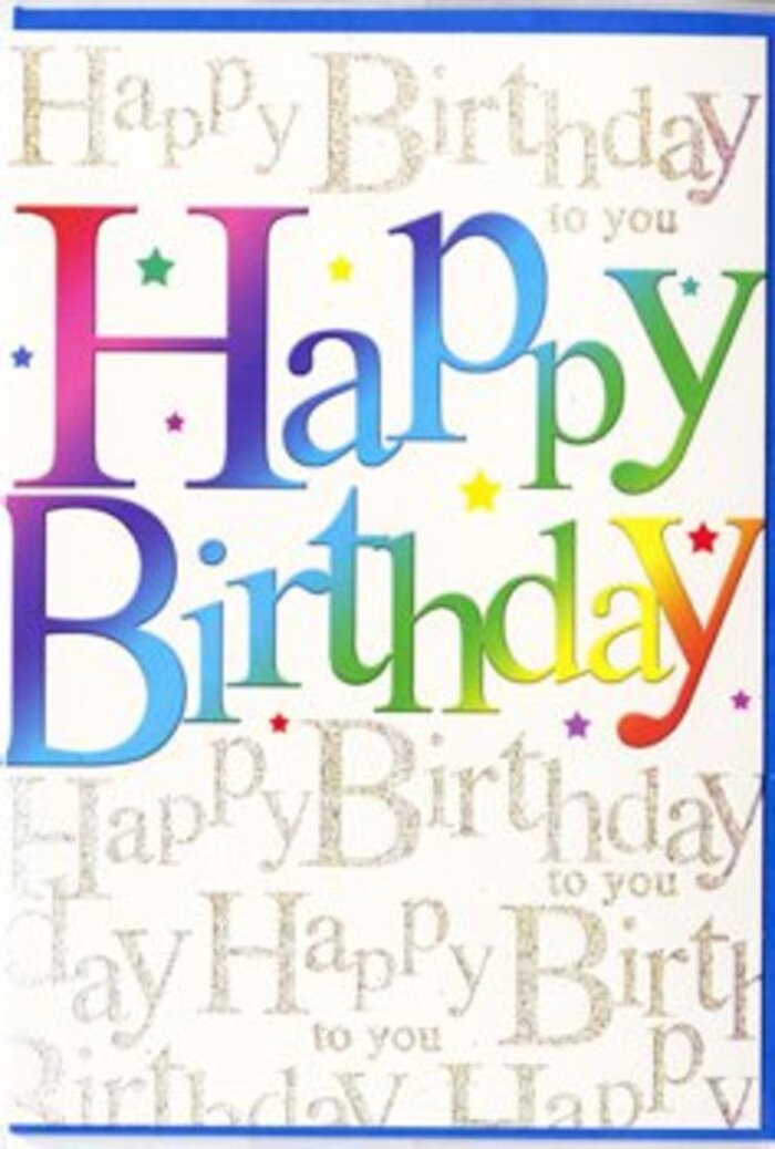 The image shows a lavishly designed birthday card whose front radiates the same joy and colour a florist might create with a carefully balanced arrangement. Dominating the composition are the words Happy Birthday, written in tall, friendly lettering that arcs lightly across the card. Each letter is filled with a smooth gradient of colour, shifting from intense ruby red at one end, through bright fuchsia, deep purples and blues, and into vivid greens and sunny yellows at the other, like walking from the cool shade of Lincoln's Inn Fields into bright daylight. The colours blend into one another without harsh lines, giving a soft, airbrushed effect that makes the entire phrase feel light, buoyant, and almost musical. Behind this bold rainbow text lies a background of warm off-white, completely overlaid with delicate lines of gold script that repeat Happy Birthday to you in a looping, calligraphic hand. The script appears slightly raised and shimmery, as though tiny flakes of gold leaf were pressed into the paper, catching the light like reflections in Holborn shopfronts after rain. Scattered across the card are fine specks and tiny stars in complementary colours-little hints of pink, blue, and lemon-suggesting confetti thrown into the air at the height of a celebration. The paper itself looks smooth and high-quality, with a gentle sheen that enhances the metallic glimmer without overwhelming the eyes. The overall feeling is one of joyous abundance, as if the card itself were joining in the chorus of birthday wishes. It would sit beautifully alongside a colourful bouquet prepared for same-day delivery around Holborn, adding a touch of shimmering warmth and heartfelt celebration to the occasion.